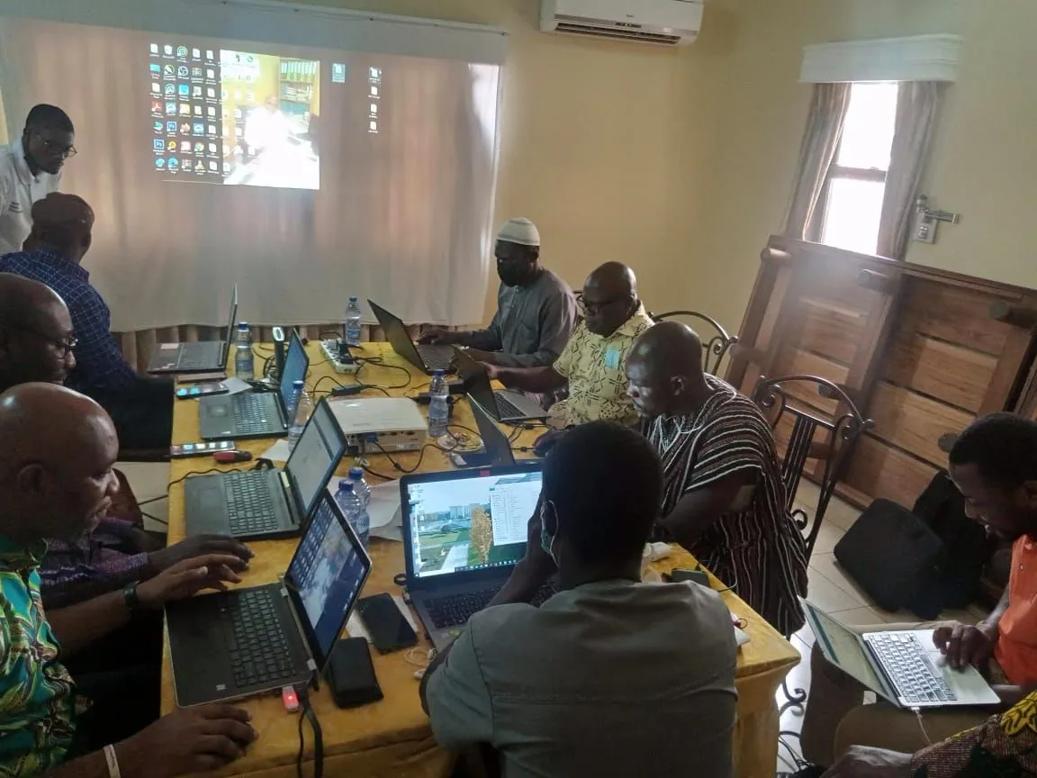 Digital CBT training session with projector and laptops