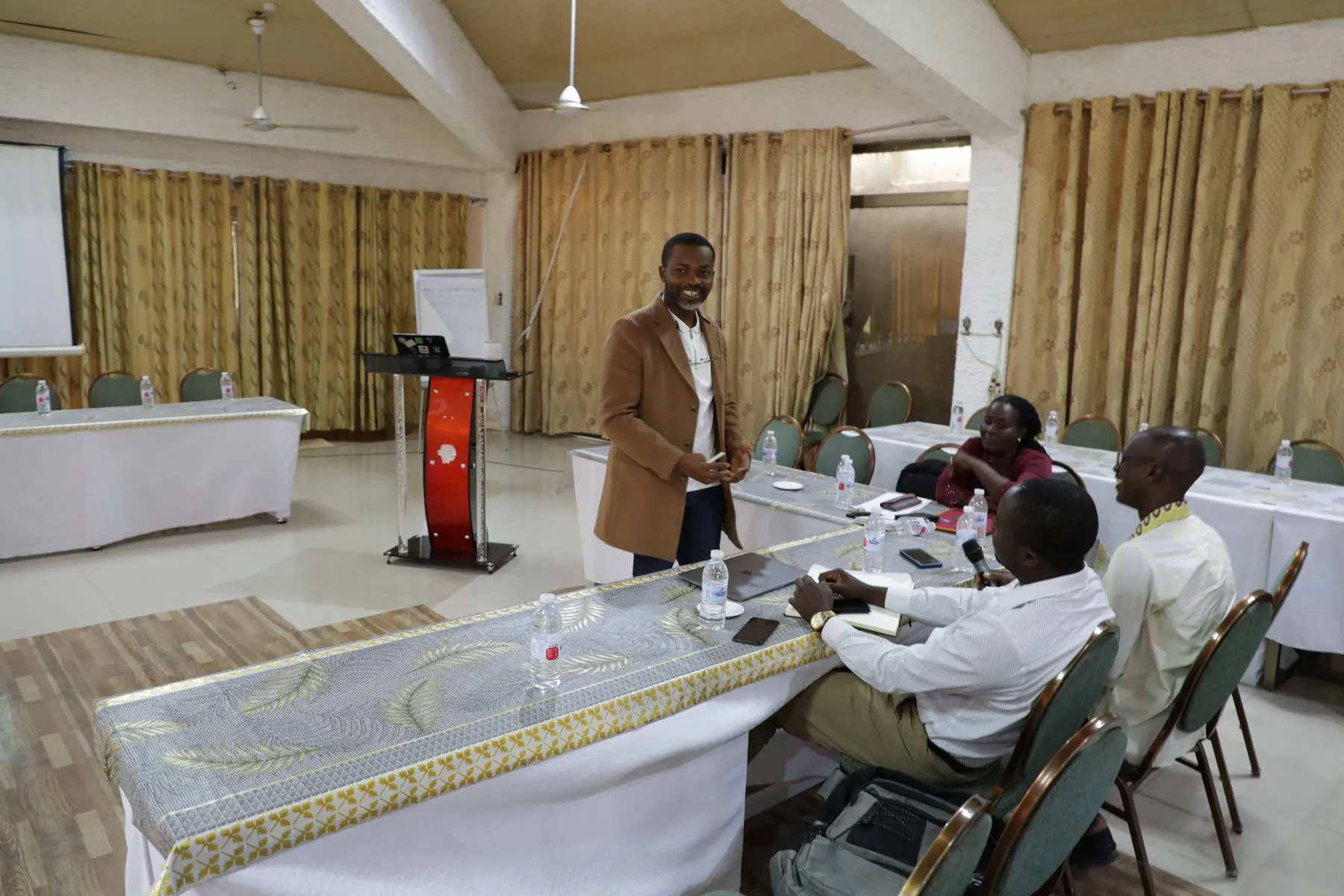 Facilitator addressing the room at a CBT workshop