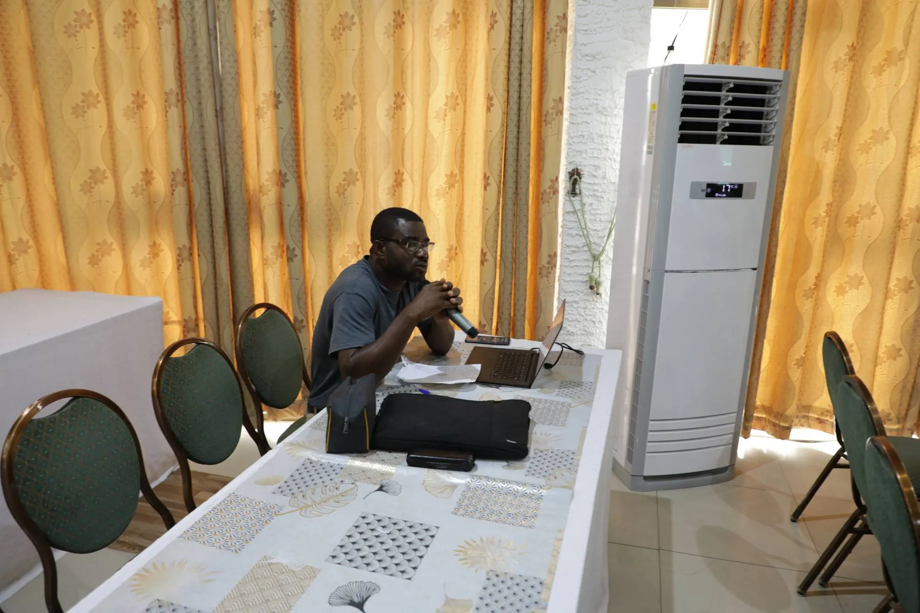 Participant working on a laptop during a CBT session