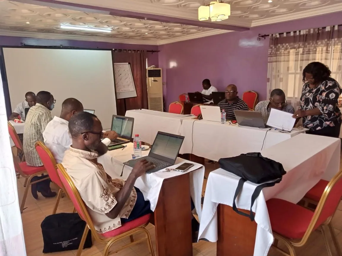 CBT workshop underway in a training room with laptops