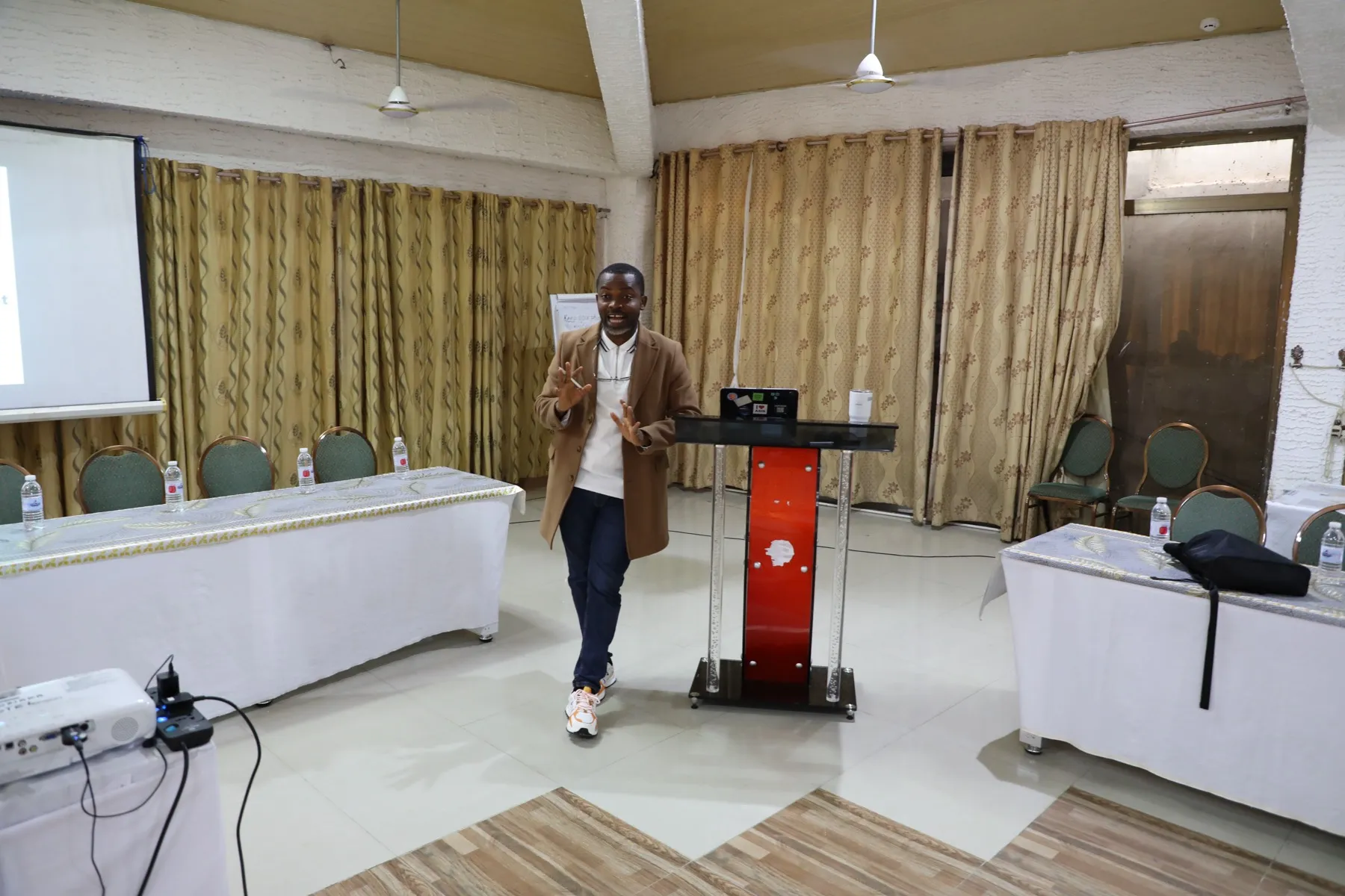Eljen Company facilitator leading a competency-based training workshop in Accra, Ghana