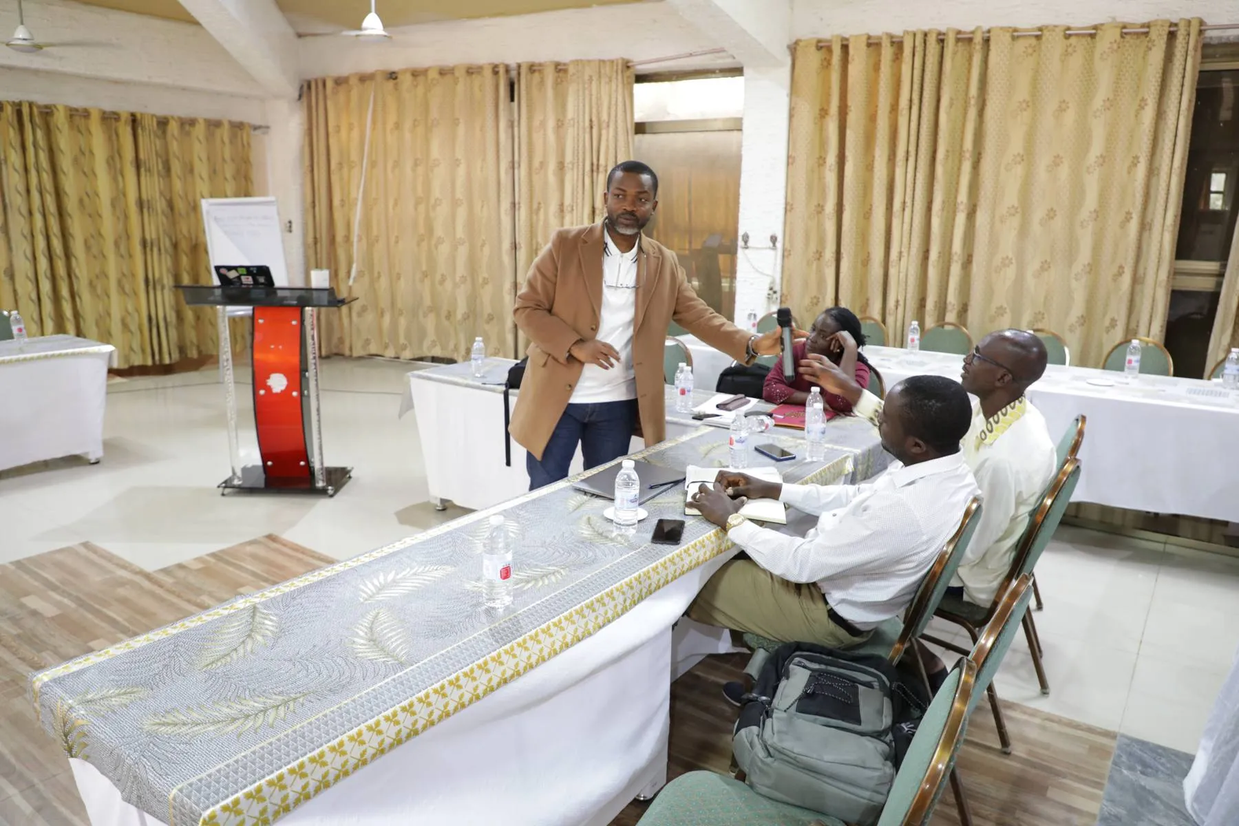 Facilitator engaging participants during a CBT workshop