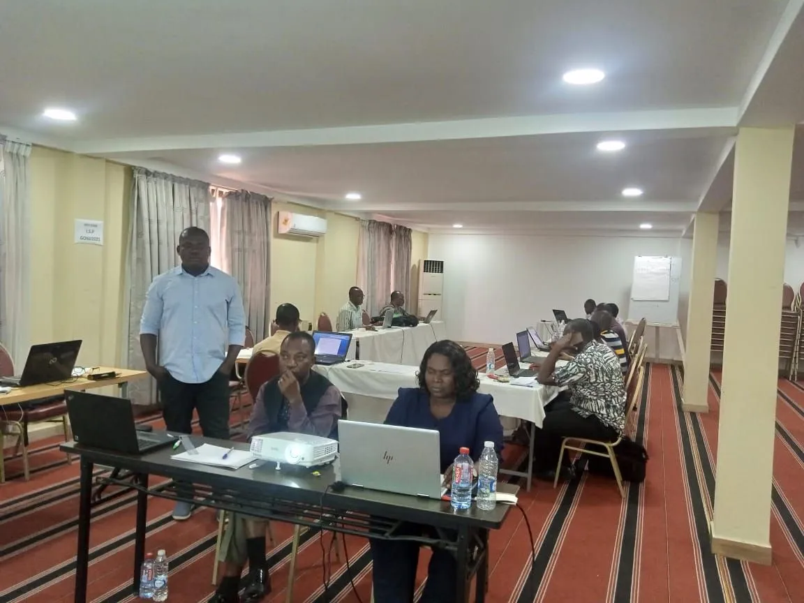 Facilitators leading a session in a conference hall